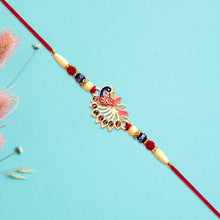 Colorful Peacock Rakhi With Stone Detailing And Red Thread